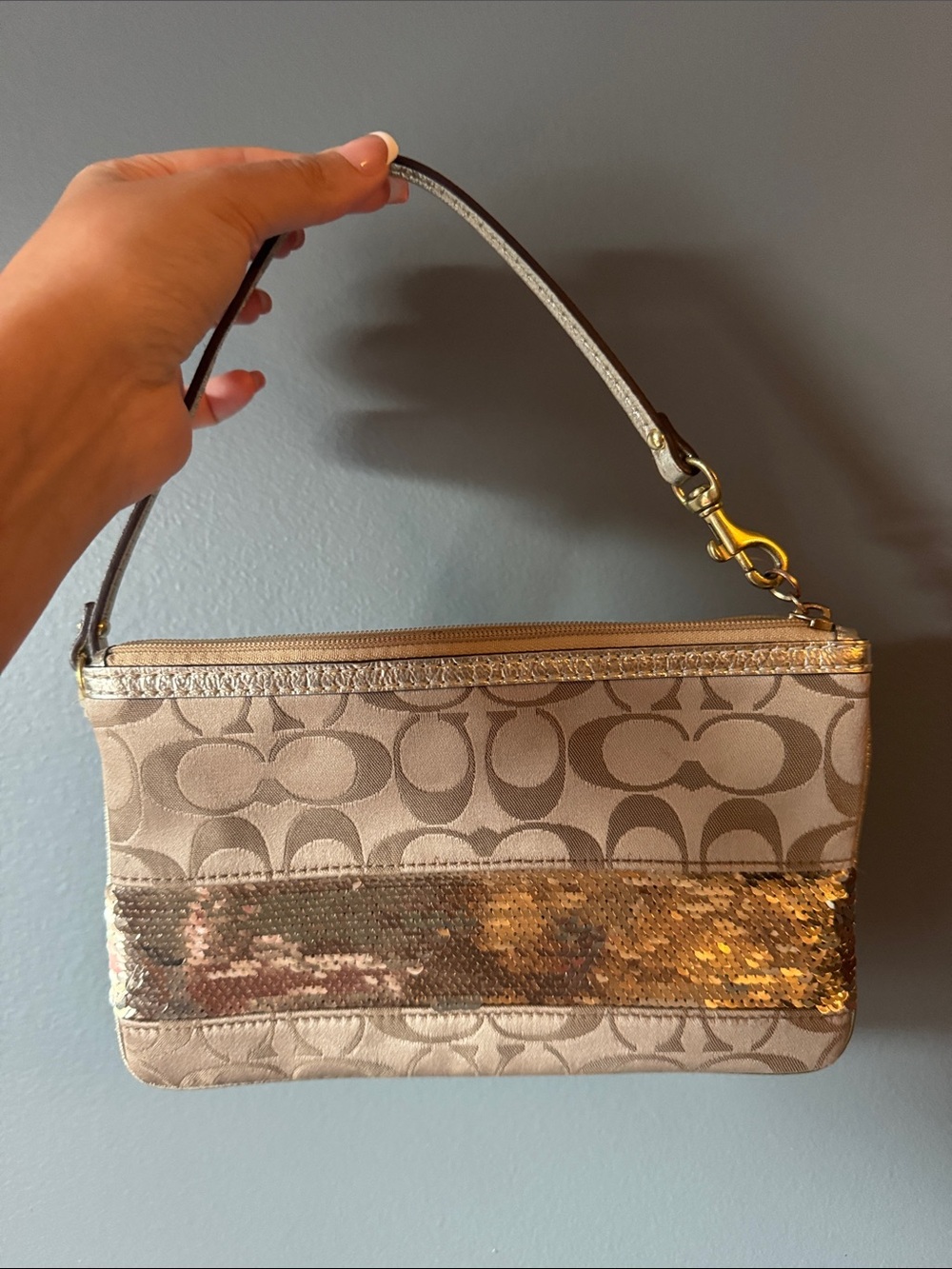 Coach Beige Signature Wristlet with Gold Sequin Stripe
